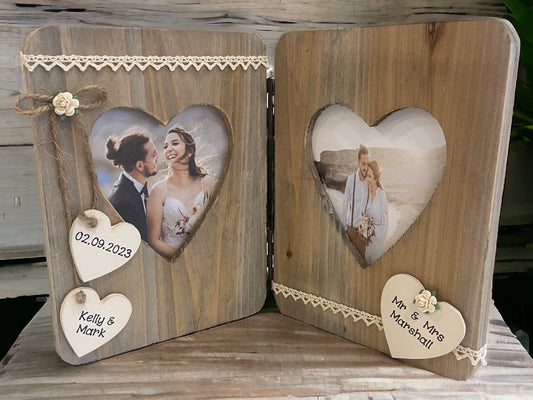 rustic wooden wedding day photo frame with cream hearts and decor