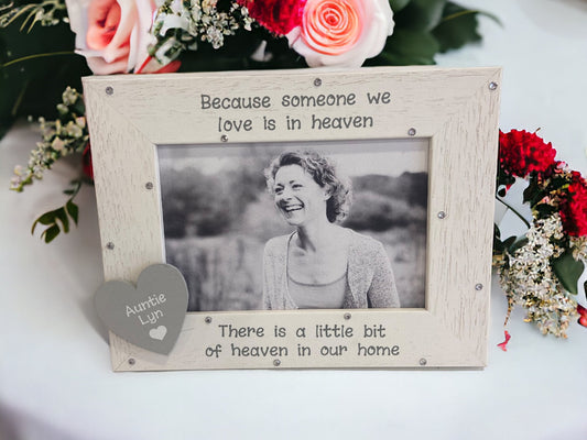wooden photo frame with condolence quote on and wooden heart with loved ones name on 