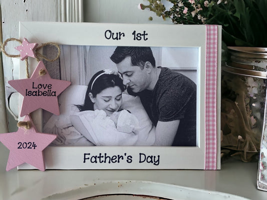 Image shows fathers day photo frame, consists of two hanging stars with name and year, as well as a smaller star to sit above, down the side runs gingham.
