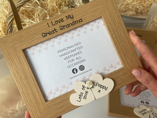Image shows photo of great grandma photo frame, decorated with cream hearts with names and cream flower.