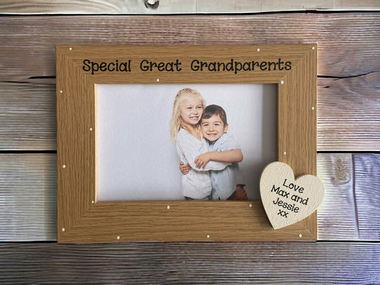 Image shows vintage brown special great grandparents photo frame, decorated with cream polka dots and a cream heart in the corner with grand children's names.