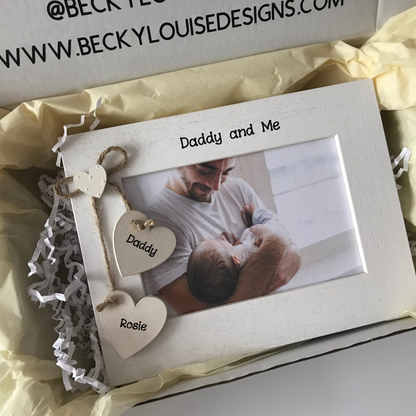 Wooden photo frame gift for a dad. Includes daddy and the childs name on cream hanging hearts, available in 6x4 and 5x7