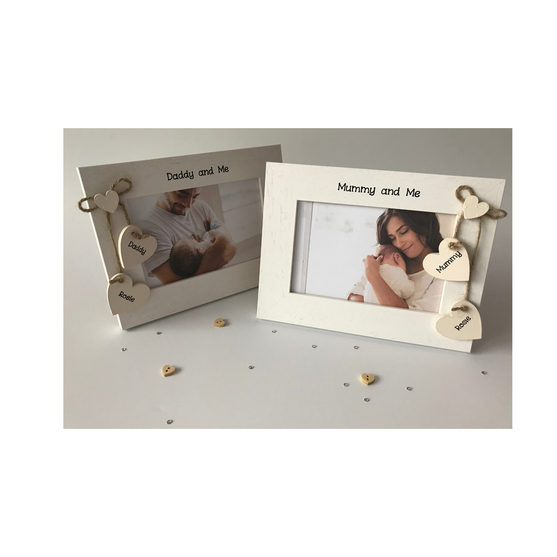 Two photo frames for mum and dad, includes new borns name and mummy and daddy on cream hanging hearts, available in 6x4 and 5x7.