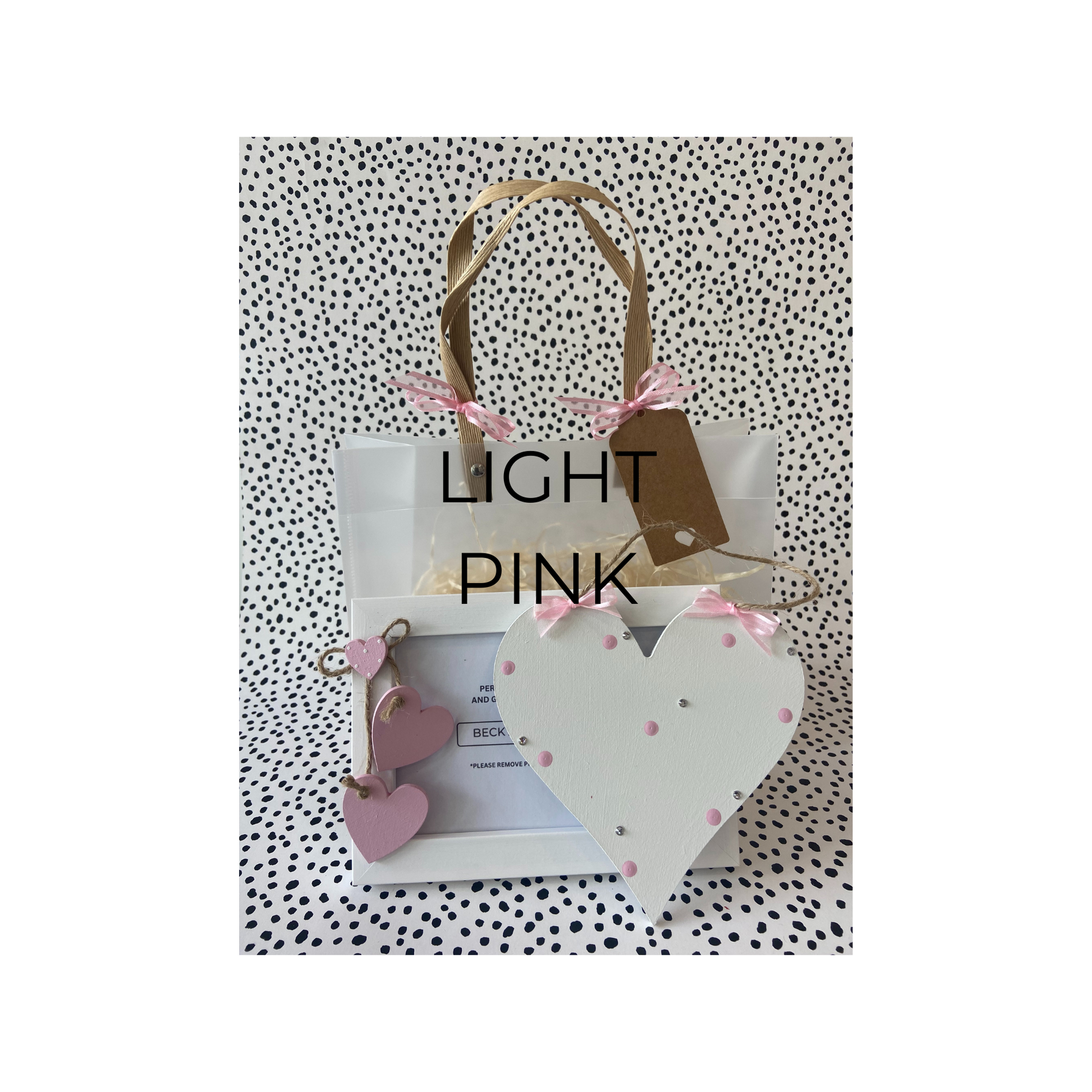 Image shows an example of a light pink gift set