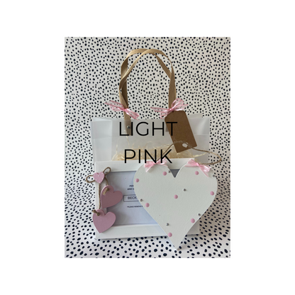 Image shows an example of a light pink gift set