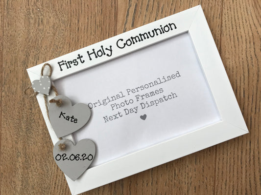 Image shows first holy communion photo frame, includes two hanging hearts with name and date.