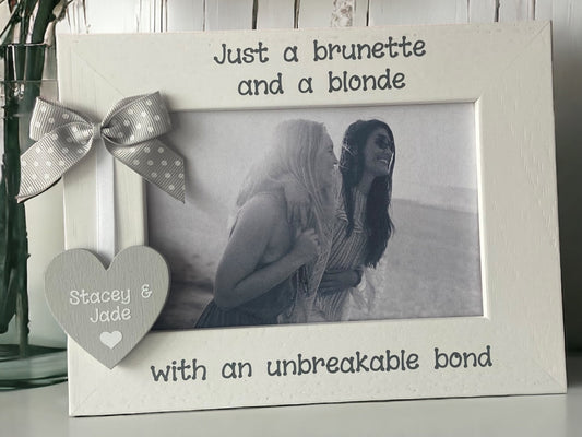White wooden photo frame with heart and bow and personalised with names